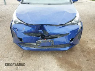 2016 Toyota Prius Two z VIN JTDKBRFU3G3511809, wystawiony jako IAAI lot #42295946 z przebiegiem 118 621 mil mil oraz . Historia ofert i sprzedaży dostępna na DreamBid. Obrazek 6.