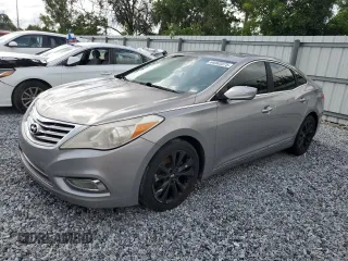 2012 Hyundai Azera z VIN KMHFG4JG7CA178216, wystawiony jako Copart lot #64363375 z przebiegiem 121 847 mil mil oraz Czysty tytuł • Clean title. Historia ofert i sprzedaży dostępna na DreamBid. Obrazek 1.