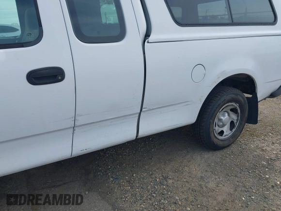2002 Ford F-150 XL with VIN 1FTRX17222NB82564, listed as a IAAI auction lot 41701719 with 1 mi miles. Bid and sale history available at carsss.com. Image 6.