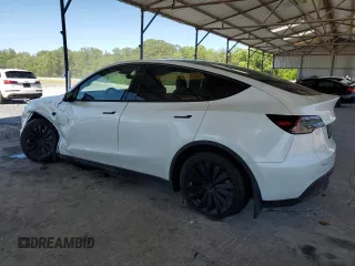 2024 Tesla Model Y с VIN 7SAYGDED5RF086456, выставлен на аукционе Copart как лот 57994835 с пробегом Не указан миль и Списание • Salvage title. История ставок и продаж доступна на DreamBid. Изображение 2.