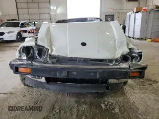 1989 Jaguar XJS z VIN SAJNV4847KC151989, wystawiony jako Copart lot #61401054 z przebiegiem 80 570 mil mil oraz Szkody całkowita. Historia ofert i sprzedaży dostępna na DreamBid. Obrazek 5.
