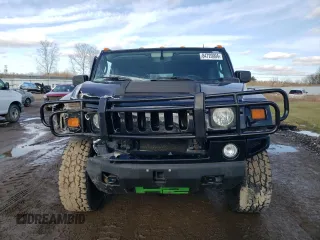 2005 Hummer H2 SUV with VIN 5GRGN23U35H111403, listed as a Copart auction lot 84720994 with 142,159 mi miles and Salvage Title. Bid and sale history available at carsss.com. Image 5.