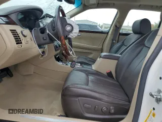 2007 Cadillac DTS Performance z VIN 1G6KD57907U171271, wystawiony jako Copart lot #79007574 z przebiegiem 147 504 mil mil oraz Szkoda całkowita • Salvage title. Historia ofert i sprzedaży dostępna na DreamBid. Obrazek 7.