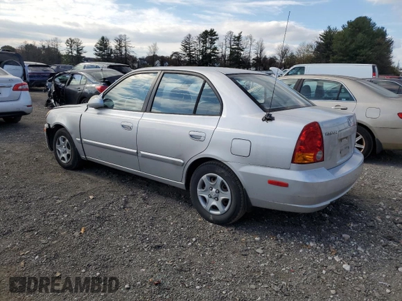 2005 Hyundai Accent GLS with VIN KMHCG45C05U618580, listed as a Copart auction lot 79239064 with 54,228 mi miles and Salvage Title. Bid and sale history available at carsss.com. Image 2.
