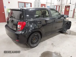 2013 Scion xD with VIN JTKKUPB40D1035393, listed as a IAAI auction lot 41808640 with 1 mi miles. Bid and sale history available at carsss.com. Image 4.