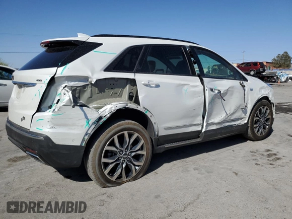 2021 Cadillac XT5 AWD Sport with VIN 1GYKNHRS2MZ156923, listed as a Copart auction lot 52696375 with 19,619 mi miles and Salvage title. Bid and sale history available at DreamBid. Image 3.