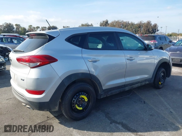 2016 Hyundai Tucson Sport with VIN KM8J33A20GU165154, listed as a IAAI auction lot 41611785 with Not Provided miles. Bid and sale history available at carsss.com. Image 12.