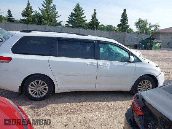 2011 Toyota Sienna XLE AAS with VIN 5TDYK3DC1BS026108, listed as a IAAI auction lot 42681177 with 201,873 mi miles and . Bid and sale history available at DreamBid. Image 13.