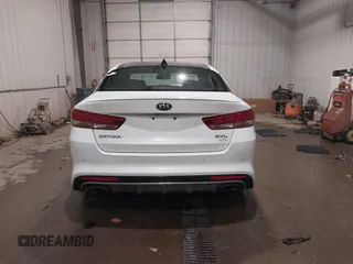 2016 Kia Optima SXL Turbo with VIN 5XXGV4L21GG073147, listed as a IAAI auction lot 41504517 with 130,467 mi miles. Bid and sale history available at carsss.com. Image 16.
