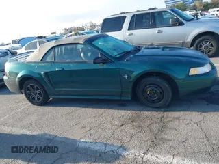 2000 Ford Mustang with VIN 1FAFP444XYF207441, listed as a IAAI auction lot 42120700 with 119,335 mi miles. Bid and sale history available at carsss.com. Image 13.