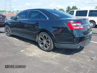 2013 Ford Taurus SHO z VIN 1FAHP2KT1DG135962, wystawiony jako IAAI lot #42449604 z przebiegiem 138 921 mil mil oraz . Historia ofert i sprzedaży dostępna na DreamBid. Obrazek 3.
