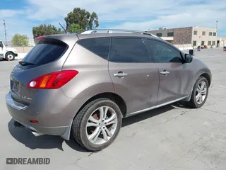 2009 Nissan Murano SL with VIN JN8AZ18W99W128700, listed as a IAAI auction lot 42021096 with 209,751 mi miles. Bid and sale history available at carsss.com. Image 4.