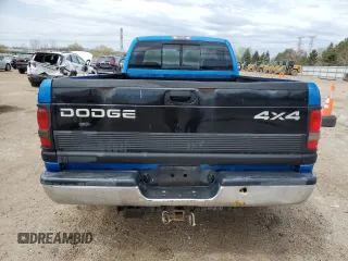 2001 Dodge 2500 z VIN 3B7KC26Z21M557430, wystawiony jako Copart lot #53995215 z przebiegiem 185 131 mil mil oraz Szkody całkowita. Historia ofert i sprzedaży dostępna na DreamBid. Obrazek 6.
