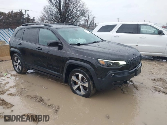 2020 Jeep Cherokee Latitude with VIN 1C4PJMCX9LD584410, listed as a IAAI auction lot 41710754 with 73,325 mi miles. Bid and sale history available at carsss.com. Image 1.