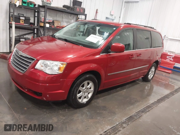 2010 Chrysler Town & Country Touring with VIN 2A4RR5D14AR212995, listed as a IAAI auction lot 41944861 with 264,784 mi miles. Bid and sale history available at carsss.com. Image 21.