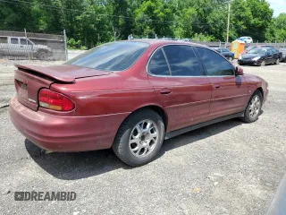 2000 Oldsmobile Intrigue GLS z VIN 1G3WX52HXYF349195, wystawiony jako Copart lot #57230215 z przebiegiem Nie podano mil oraz Szkody całkowita. Historia ofert i sprzedaży dostępna na DreamBid. Obrazek 3.