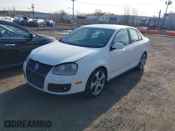2009 Volkswagen Jetta GLI with VIN 3VWFJ71K89M073155, listed as a IAAI auction lot 41949089 with 138,772 mi miles and . Bid and sale history available at DreamBid. Image 2.