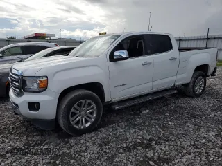 2015 GMC Canyon 2WD SLT with VIN 1GTG5CE39F1100251, listed as a Copart auction lot 60050535 with 69,199 mi miles and Salvage title. Bid and sale history available at DreamBid. Image 1.