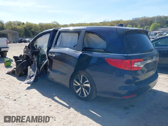 2020 Honda Odyssey Elite with VIN 5FNRL6H95LB052590, listed as a IAAI auction lot 42231280 with 65,165 mi miles and . Bid and sale history available at DreamBid. Image 3.