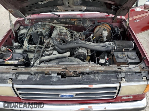 1990 Ford Bronco Custom with VIN 1FMEU15H2LLA70449, listed as a Copart auction lot 77953604 with 12,519 mi miles and Salvage Title. Bid and sale history available at DreamBid. Image 12.