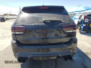 2018 Jeep Grand Cherokee Trackhawk z VIN 1C4RJFN90JC293820, wystawiony jako Copart lot #63778505 z przebiegiem 87 682 mil mil oraz Szkoda całkowita • Salvage title. Historia ofert i sprzedaży dostępna na DreamBid. Obrazek 6.