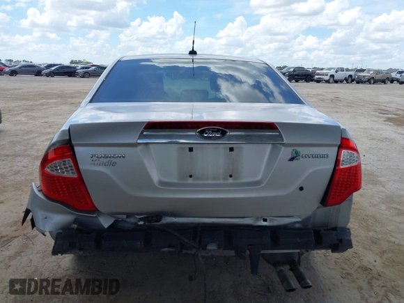 2012 Ford Fusion Hybrid с VIN 3FADP0L36CR426322, выставлен на аукционе IAAI как лот 42592635 с пробегом 151 941 миль миль и . История ставок и продаж доступна на DreamBid. Изображение 17.
