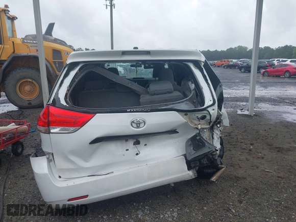 2014 Toyota Sienna L with VIN 5TDZK3DC9ES473780, listed as a IAAI auction lot 42245274 with 203,060 mi miles and . Bid and sale history available at DreamBid. Image 17.