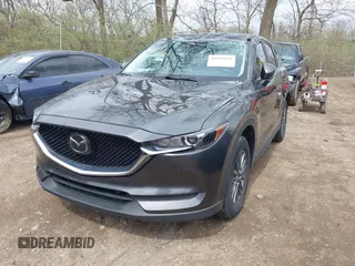 2020 Mazda CX-5 Touring with VIN JM3KFBCM1L0792396, listed as a IAAI auction lot 41949124 with 118,280 mi miles. Bid and sale history available at carsss.com. Image 2.