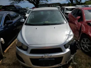 2012 Chevrolet Sonic LT with VIN 1G1JC5SH7C4136384, listed as a Copart auction lot 82845654 with 0 mi miles and Salvage Title. Bid and sale history available at carsss.com. Image 5.
