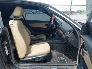 2008 BMW 1 Series 128i with VIN WBAUN13548VH79563, listed as a IAAI auction lot 42186957 with 154,400 mi miles and . Bid and sale history available at carsss.com. Image 5.