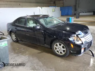 2005 Cadillac CTS with VIN 1G6DP567X50136502, listed as a Copart auction lot 74001284 with 133,361 mi miles and Salvage Title. Bid and sale history available at carsss.com. Image 4.