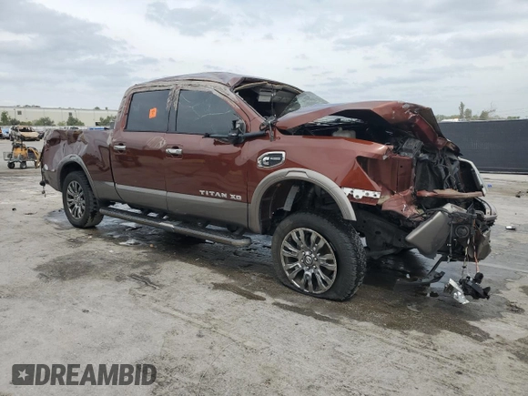 2016 Nissan Titan Platinum Reserve z VIN 1N6BA1F28GN506397, wystawiony jako Copart lot #53831235 z przebiegiem 258 474 mil mil oraz Nie do naprawy • Non repairable. Historia ofert i sprzedaży dostępna na DreamBid. Obrazek 4.