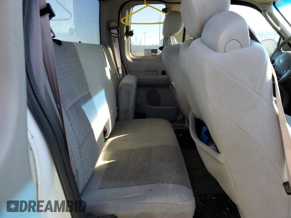 2003 Ford F-150 XL with VIN 2FTRX18L53CA29904, listed as a Copart auction lot 45022105 with 184,018 mi miles and Salvage title. Bid and sale history available at DreamBid. Image 10.