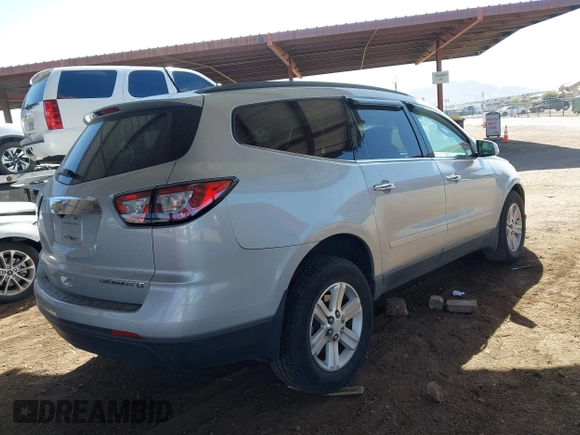 2013 Chevrolet Traverse LT with VIN 1GNKVGKD7DJ198330, listed as a IAAI auction lot 41669654 with 185,602 mi miles and . Bid and sale history available at DreamBid. Image 4.