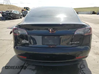 2020 Tesla Model 3 Long Range with VIN 5YJ3E1EB4LF599909, listed as a Copart auction lot 52435425 with 118,574 mi miles and Salvage Title. Bid and sale history available at DreamBid. Image 6.
