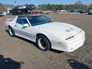 1990 Pontiac Firebird z VIN 1G2FW23F9LL206767, wystawiony jako IAAI lot #42081028 z przebiegiem 64 836 mil mil oraz . Historia ofert i sprzedaży dostępna na DreamBid. Obrazek 1.