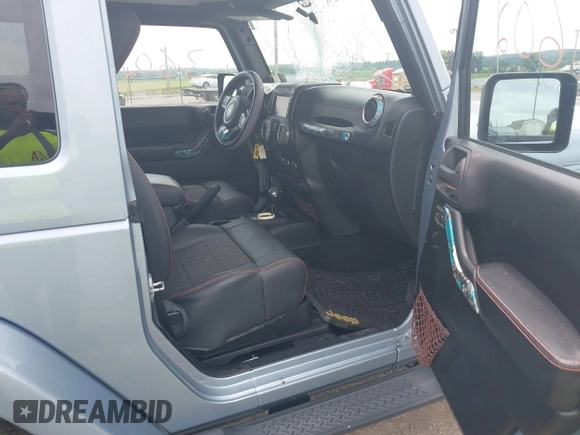 2012 Jeep Wrangler Arctic with VIN 1C4AJWBG7CL148325, listed as a IAAI auction lot 39943602 with 86,625 mi miles and . Bid and sale history available at DreamBid. Image 5.