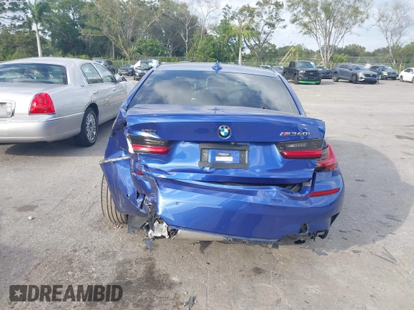 2020 BMW 3 Series M340i xDrive with VIN WBA5U9C00LA379345, listed as a IAAI auction lot 41256225 with 57,856 mi miles and . Bid and sale history available at DreamBid. Image 16.