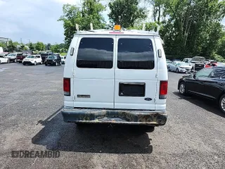 2011 Ford Econoline Cargo Commercial z VIN 1FTNE2EL2BDB32114, wystawiony jako IAAI lot #42774199 z przebiegiem 130 449 mil mil oraz . Historia ofert i sprzedaży dostępna na DreamBid. Obrazek 22.