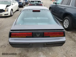 1986 Pontiac Firebird with VIN 1G2FS87S2GL247754, listed as a Copart auction lot 49340634 with 52,081 mi miles and Salvage Title. Bid and sale history available at carsss.com. Image 6.