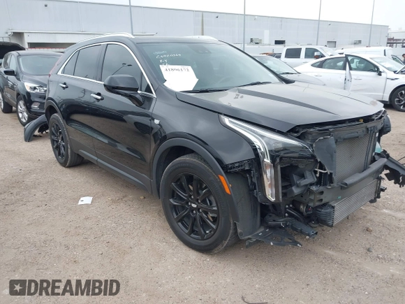 2023 Cadillac XT4 FWD Luxury with VIN 1GYAZAR49PF128552, listed as a IAAI auction lot 41806172 with 36,081 mi miles and . Bid and sale history available at carsss.com. Image 1.