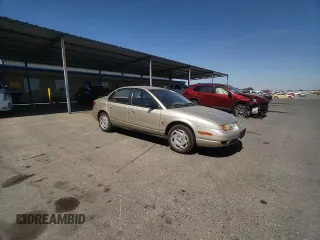 2000 Saturn SL with VIN 1G8ZK5274YZ103237, listed as a Copart auction lot 60558105 with 126,320 mi miles and Salvage title. Bid and sale history available at DreamBid. Image 14.