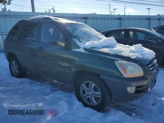 2005 Kia Sportage LX with VIN KNDJE723957107441, listed as a Copart auction lot 41530635 with 146,045 mi miles and Salvage Title. Bid and sale history available at carsss.com. Image 4.