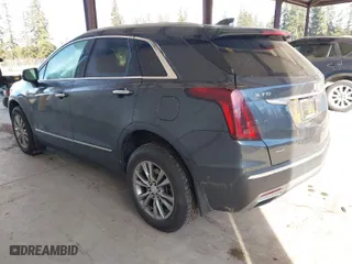 2021 Cadillac XT5 AWD Premium Luxury with VIN 1GYKNDRS3MZ139802, listed as a IAAI auction lot 41698772 with 62,886 mi miles. Bid and sale history available at carsss.com. Image 3.