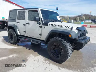 2011 Jeep Wrangler Unlimited Rubicon with VIN 1J4HA6H11BL568186, listed as a IAAI auction lot 41852764 with 143,082 mi miles and . Bid and sale history available at DreamBid. Image 1.