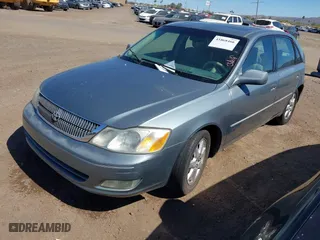 2001 Toyota Avalon XL w/Bucket Seats with VIN 4T1BF28B31U150439, listed as a IAAI auction lot 41868466 with 210,828 mi miles. Bid and sale history available at carsss.com. Image 2.