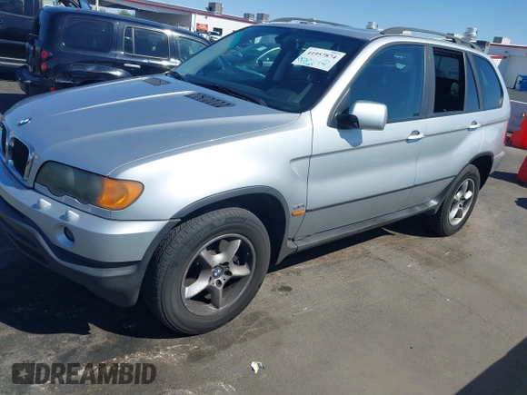2002 BMW X5 3.0i with VIN 5UXFA53552LV70703, listed as a IAAI auction lot 41957874 with 144,369 mi miles. Bid and sale history available at carsss.com. Image 12.