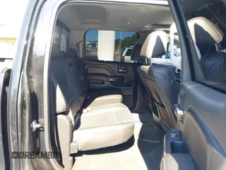 2015 GMC Sierra 1500 Denali with VIN 3GTU2WEJ6FG400004, listed as a IAAI auction lot 42097356 with 148,544 mi miles and . Bid and sale history available at DreamBid. Image 8.