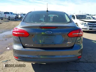 2016 Ford Focus SE z VIN 1FADP3F27GL321507, wystawiony jako IAAI lot #41278203 z przebiegiem 157 910 mil mil oraz . Historia ofert i sprzedaży dostępna na DreamBid. Obrazek 16.