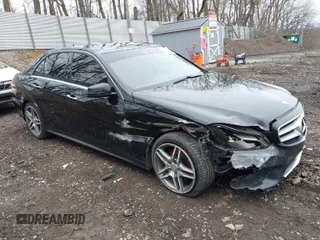 2015 Mercedes-Benz E-Class E 350 Luxury with VIN WDDHF8JBXFB131147, listed as a IAAI auction lot 41936876 with 147,376 mi miles. Bid and sale history available at carsss.com. Image 1.